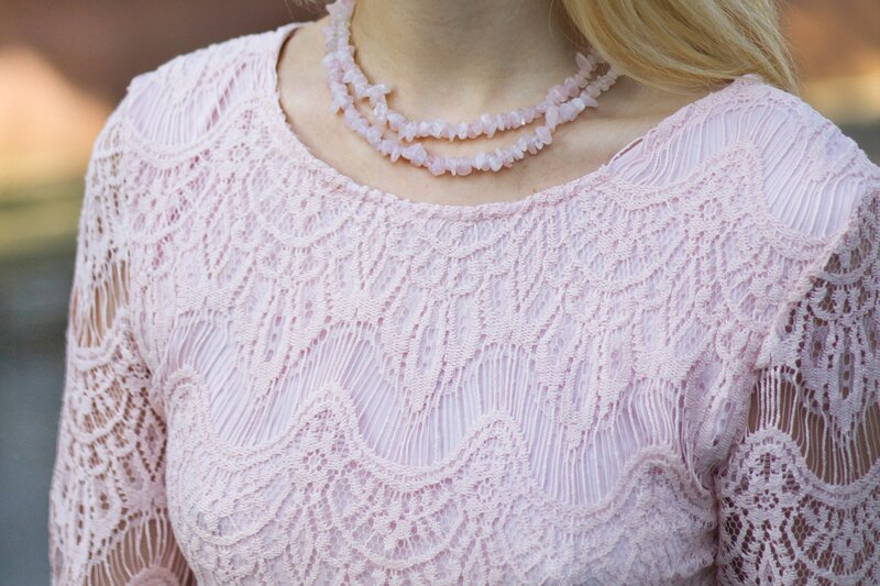 Fashion blogger Aurora Berill wearing Rose Quartz crystal necklace